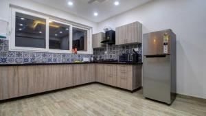 Kuchyň nebo kuchyňský kout v ubytování Villa Rouz by DanCenter