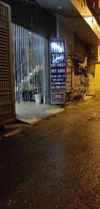 a building with a sign on the side of it at nhà trọ my anh in Hanoi