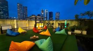 a group of colorful pillows on top of a building at d'primahotel Mega Kuningan in Jakarta
