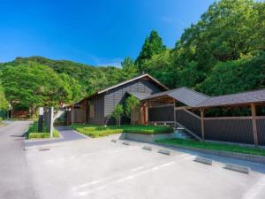a parking lot in front of a building at Tsukiyominoza in Ise