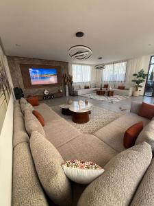 Χώρος καθιστικού στο Villa B Marrakech chambres d hôtes Piscine Zéro vis-à-vis