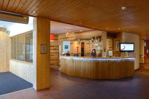 TV a/nebo společenská místnost v ubytování Villages Clubs du Soleil - LES KARELLIS + 12 fotografií