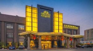 a building with yellow lights on top of it at OSOTTO RECREATION HOTEL in Shiken