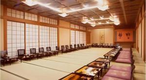 a large room with rows of tables and chairs at Hotel Riverge Akebono in Omachi +255 photos