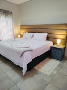 Ένα ή περισσότερα κρεβάτια σε δωμάτιο στο Vista Retreat on 3222