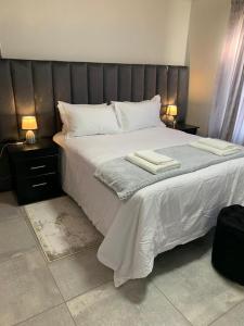 Ένα ή περισσότερα κρεβάτια σε δωμάτιο στο Vista Retreat on 3222 +29 φωτογραφίες