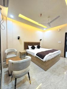 Postel nebo postele na pokoji v ubytování Arka Hotel and Restaurant