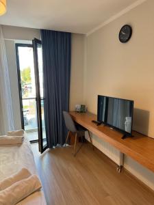 Μια τηλεόραση ή/και κέντρο ψυχαγωγίας στο Оrbi Palase Deluxe