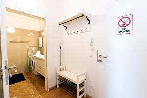 a small bathroom with a sink and a toilet at 214 Salzburg, Studio Apartment, 30m2, 2-4 Personen in Klagenfurt +28 photos