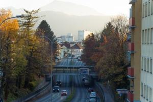 a city street with cars driving down a road at 214 Salzburg, Studio Apartment, 30m2, 2-4 Personen in Klagenfurt