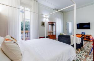 Postel nebo postele na pokoji v ubytování Pallamaglio suites