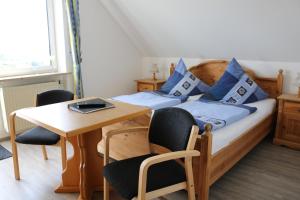 Postel nebo postele na pokoji v ubytování Ferienwohnung Gruber am Brombachsee