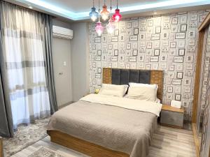 Ένα ή περισσότερα κρεβάτια σε δωμάτιο στο Luxurious apartment in cairo