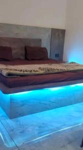 Postel nebo postele na pokoji v ubytování The enclave inn