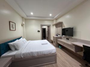 TV a/nebo společenská místnost v ubytování Dibang Hotel & Resort