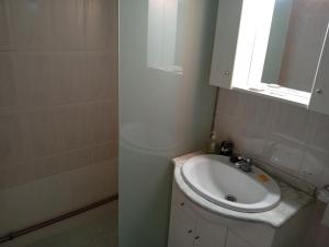 Et badeværelse på Alojamiento Cervantes