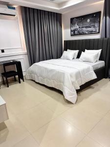 Postel nebo postele na pokoji v ubytování Jibams Apartment Luxe1