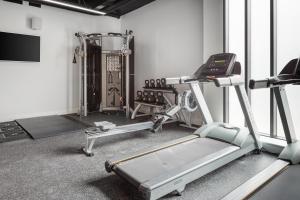 a gym with two treadmills and a treadmill at The Ascent in Liverpool