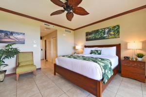 a bedroom with a bed and a ceiling fan at Kapalua Golf Villas 19T6 · KGV 19T6 Updated 2BD Kapalua Panorami in Kahana +43 photos