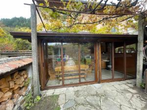 an extension to a house with sliding glass doors at Св.Георги in Sapareva Banya