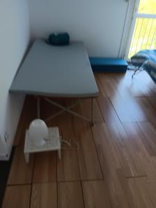 a white table on the floor in a room at Olembe Garden in Avon +31 photos