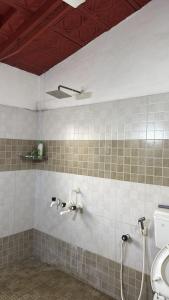 Koupelna v ubytování Cityscape Residence and Homestay Tirupur