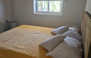 Ένα ή περισσότερα κρεβάτια σε δωμάτιο στο Apartman Katija Cavtat by Villas Guide