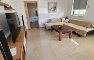 Μια τηλεόραση ή/και κέντρο ψυχαγωγίας στο Apartman Katija Cavtat by Villas Guide