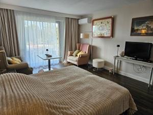 Et tv og/eller underholdning på Résidence Chiberta Anglet océan golf surf