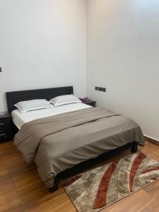 Postel nebo postele na pokoji v ubytování Royce Resort