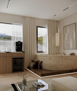 a living room with a bath tub and a fireplace at Hathor Dahabiya Cruise in Aswan