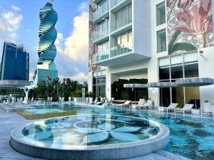 a swimming pool in the middle of a building at Luxury apt in Panama City 2 Rooms 3 Baths office in Panama City