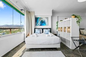 Ένα ή περισσότερα κρεβάτια σε δωμάτιο στο Marbella del Est