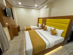 Ένα ή περισσότερα κρεβάτια σε δωμάτιο στο New Hotel National