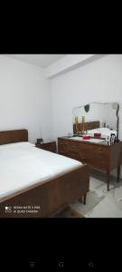 Ένα ή περισσότερα κρεβάτια σε δωμάτιο στο Bellissimo appartamento a Noto