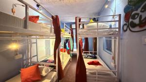 a dorm room with two bunk beds in it at Ghumakkad Jodhpur in Jodhpur