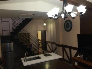 Een TV en/of entertainmentcenter bij Pretty Nanwan B&B
