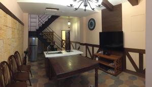 Een TV en/of entertainmentcenter bij Pretty Nanwan B&B

