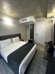 Voodi või voodid majutusasutuse MIT Hotel Tbilisi toas +68 fotot