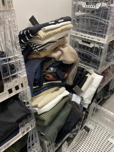 a drawer full of clothes and baskets in a closet at R Zajad Witnica in Witnica