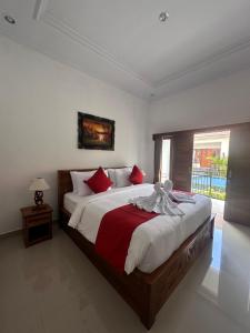 Postel nebo postele na pokoji v ubytování Memela Bungalow + 29 fotografií