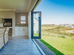 Gallery image of 35 Brookside on Kingswood Golf Estate in George