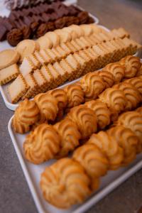 a display of different types of pastries on a table at Hotiday Diano Marina in Diano Marina +7 photos