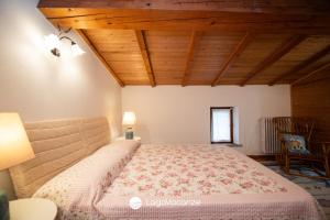 Postel nebo postele na pokoji v ubytování Casa Reale