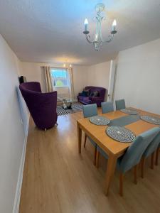 a dining room with a table and chairs at The Apartment in Northallerton