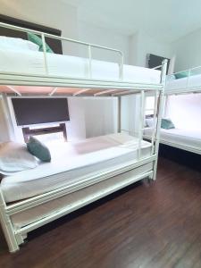 a couple of bunk beds in a room at The Breakout Room ICE BSD in Serpong