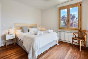 Postel nebo postele na pokoji v ubytování Villa Cinco Vistas Jaca + 36 fotografií