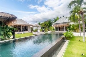 an image of a swimming pool in a villa at OMAÏA Private villas in Amed