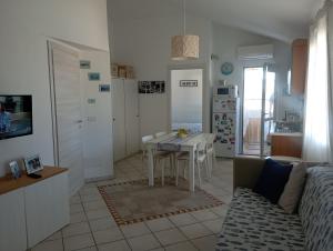 Μια τηλεόραση ή/και κέντρο ψυχαγωγίας στο Appartamento sunset