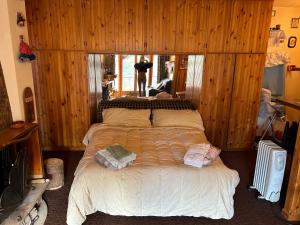 Ένα ή περισσότερα κρεβάτια σε δωμάτιο στο Campo Felice Appartamento